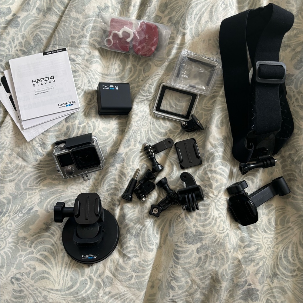 GoPro Hero4 with 2 batteries and accessories.
